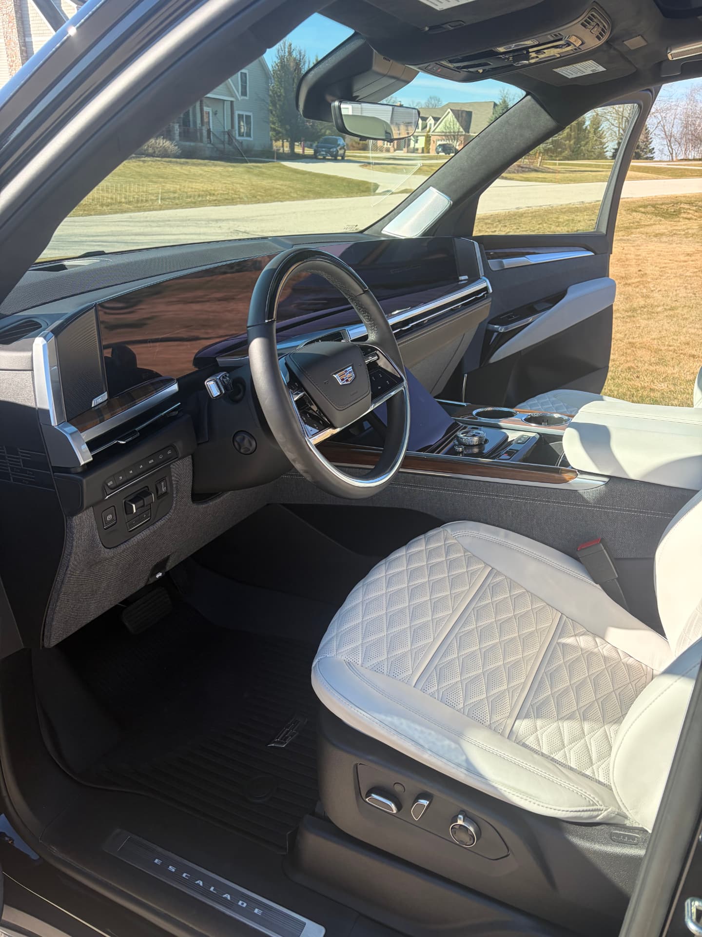 Freshly detailed Cadillac Escalade interior with white quilted leather