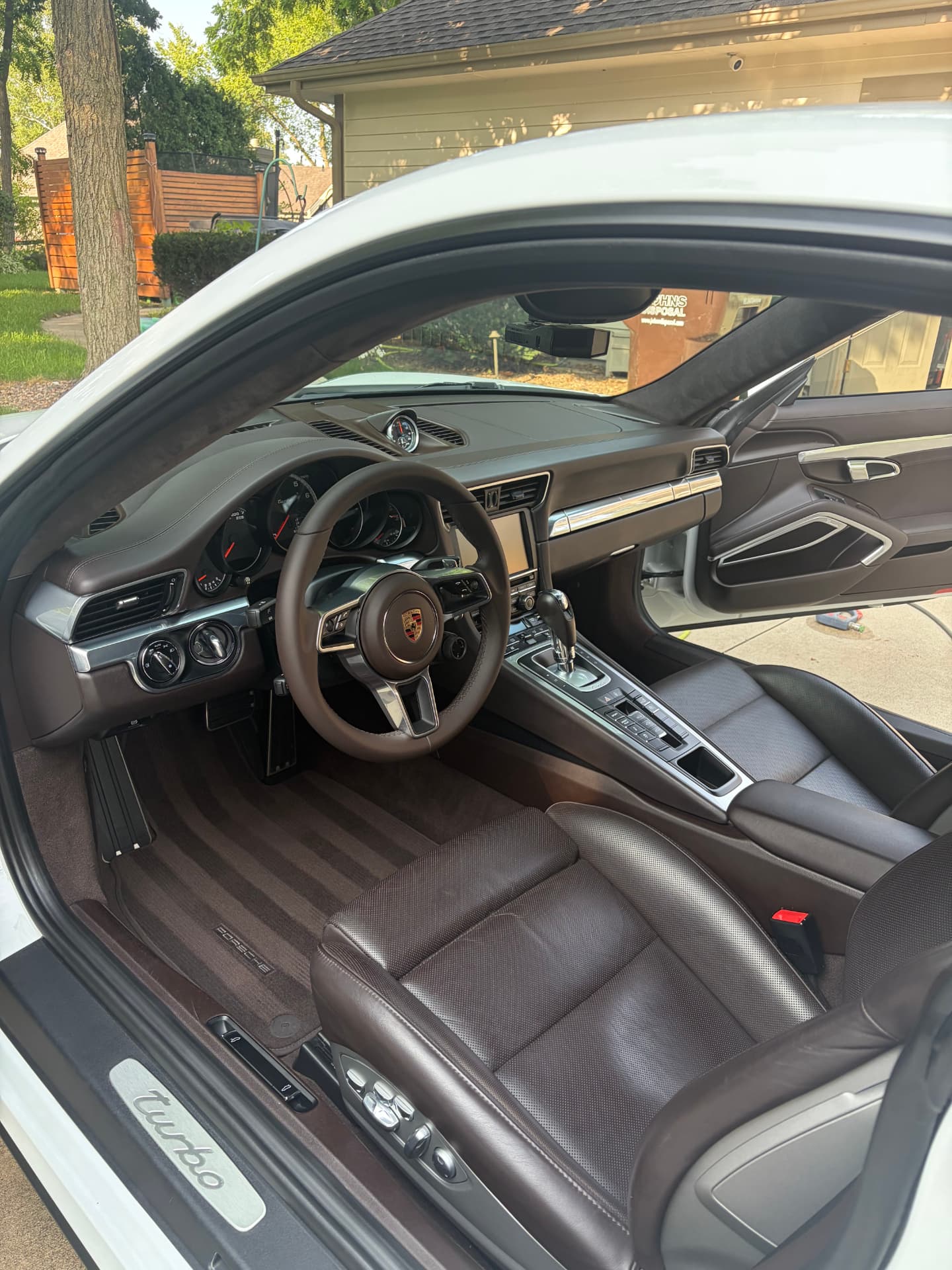 Freshly detailed Porsche 911 Turbo interior with brown leather