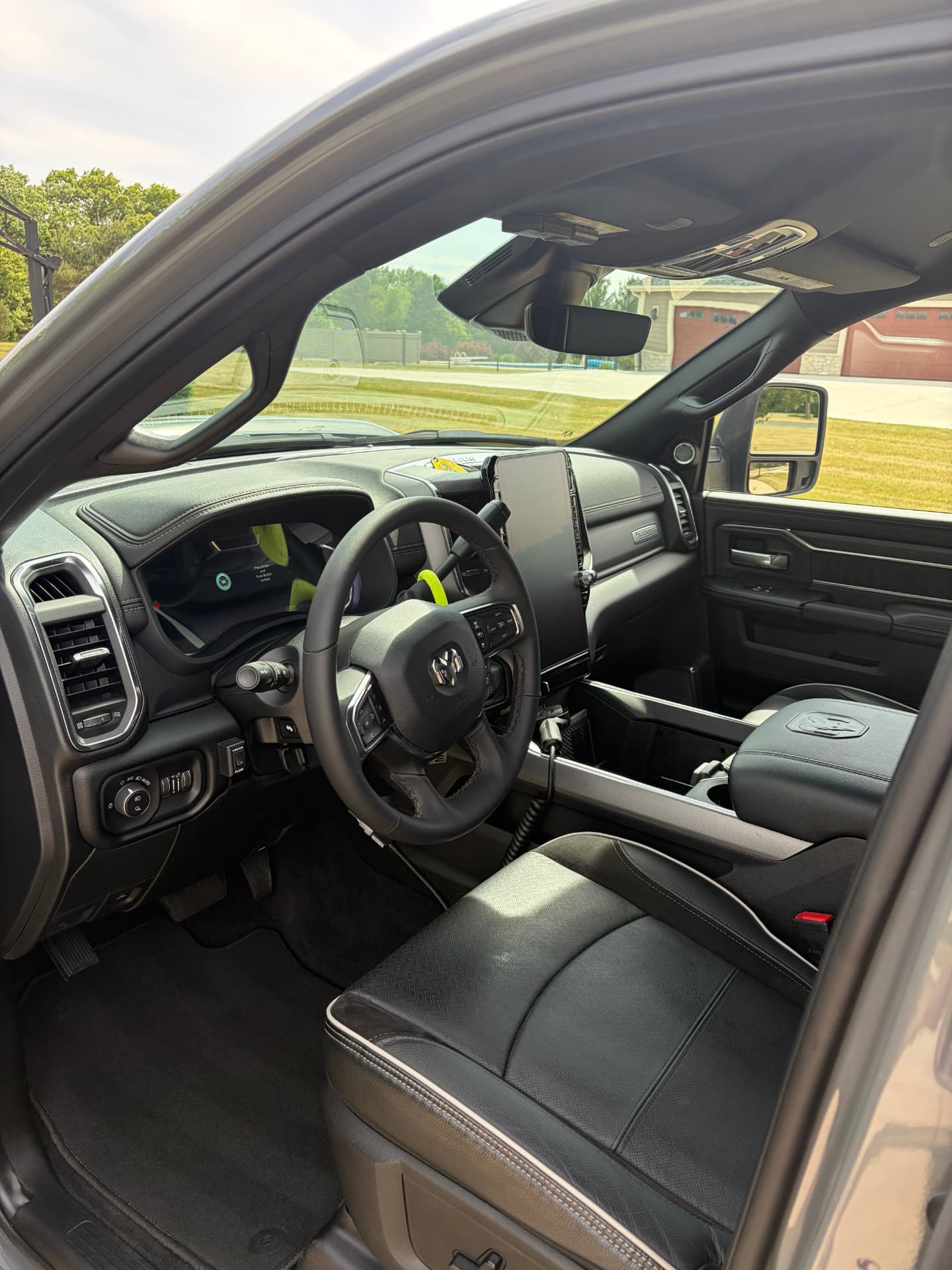 Deep cleaned black leather interior of a Ram truck